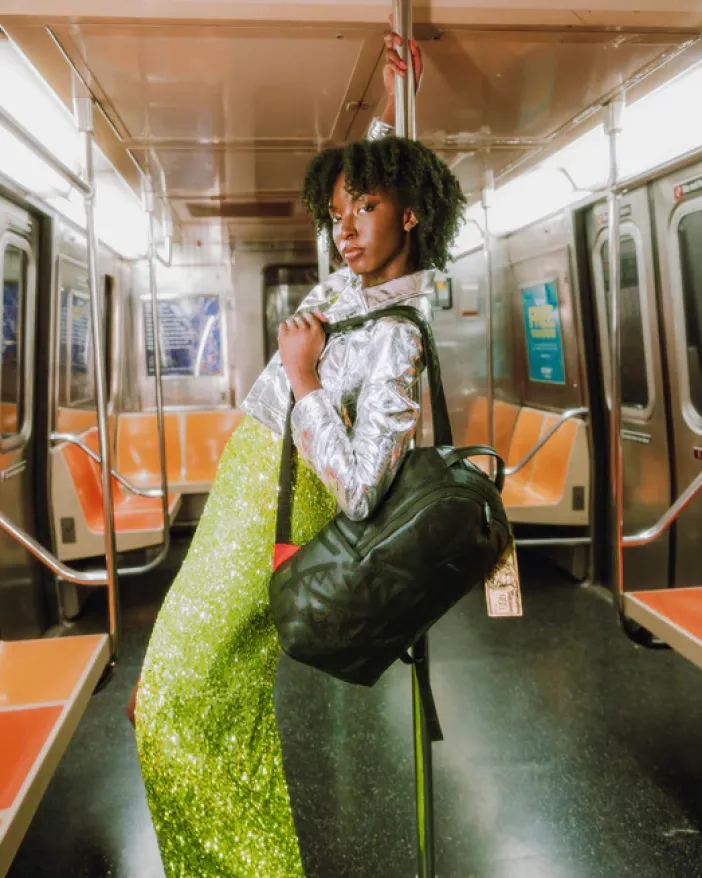 AFRICAN INTELLIGENCE 9 APEX GENIUS BACKPACK - SANDFLOWER COLLAB>SPRAYGROUND New