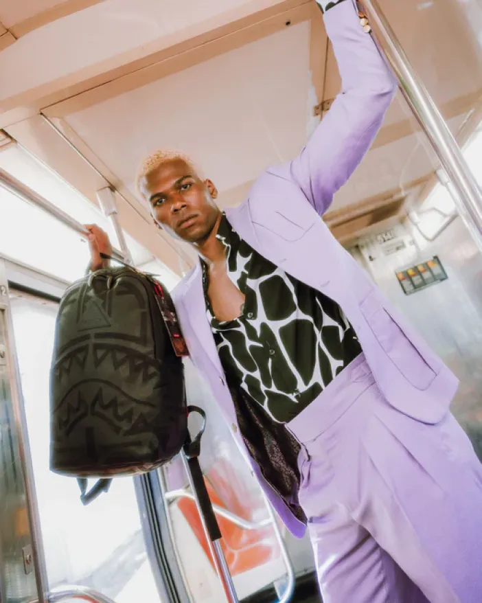 AFRICAN INTELLIGENCE 9 APEX GENIUS BACKPACK - SANDFLOWER COLLAB>SPRAYGROUND New
