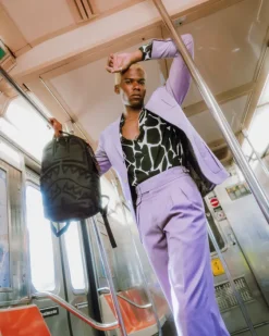 AFRICAN INTELLIGENCE 9 APEX GENIUS BACKPACK - SANDFLOWER COLLAB><noscript><img width=