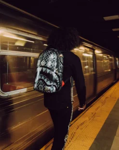 AFRICAN INTELLIGENCE 9 POWER GLYPHICS BACKPACK - SANDFLOWER COLLAB><noscript><img width=