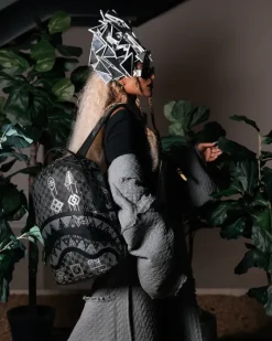 AFRICAN INTELLIGENCE 9 POWER GLYPHICS BACKPACK - SANDFLOWER COLLAB><noscript><img width=