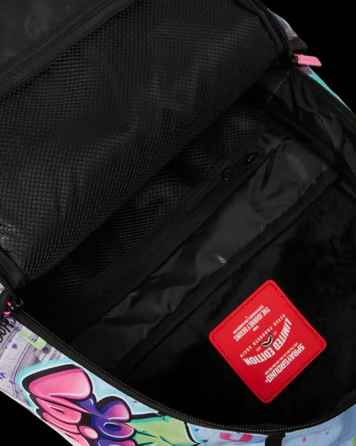 KARMA'S WORLD TURN UP THE VOLUME BACKPACK>SPRAYGROUND New