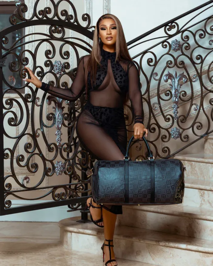 OBSIDIAN STUNNER A.i.6 SANDFLOWER COLLAB DUFFLE>SPRAYGROUND New