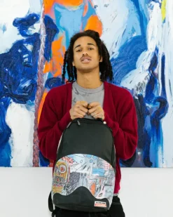 OFFICIAL BASQUIAT UNTITLED 1982 BACKPACK (DLXV)><noscript><img width=