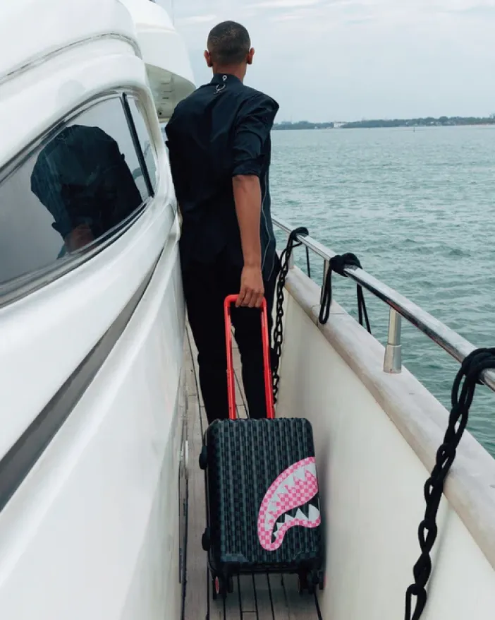 SHARKS IN CANDY CARRY-ON LUGGAGE>SPRAYGROUND