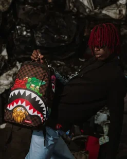 SHARKS IN PARIS CHARACTERS SNEAKIN BACKPACK (DLXV)>SPRAYGROUND